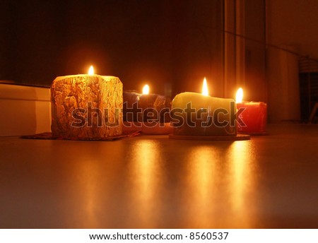 Alight festive candles