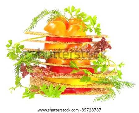 healthy vegetables sandwich with tomato and pepper slices isolated on white background