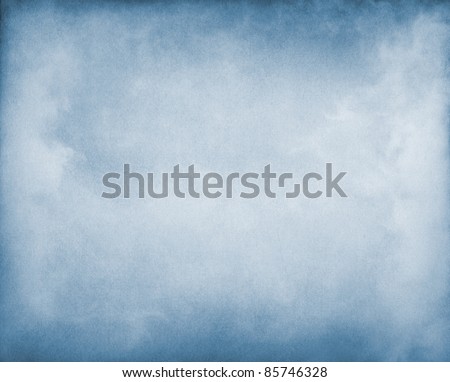Fog and clouds on a blue paper background.  Image displays a pleasing paper grain and texture at 100%. Royalty-Free Stock Photo #85746328