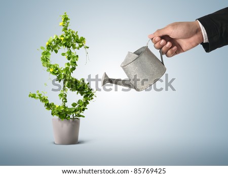 Businessman and watering pot  (path in side) Royalty-Free Stock Photo #85769425