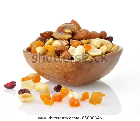 Delicious and healthy mixed dried fruit, nuts and seeds Royalty-Free Stock Photo #85800346