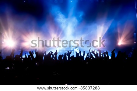 cheering crowd at concert Royalty-Free Stock Photo #85807288