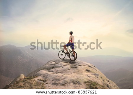 Cyclist on the top of a hill