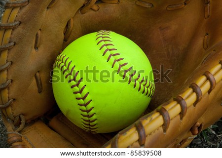 softball with accessory