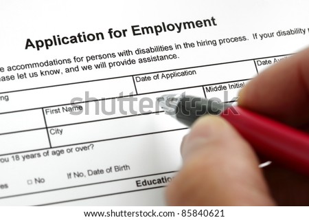 Completing an job application form with focus on heading Royalty-Free Stock Photo #85840621