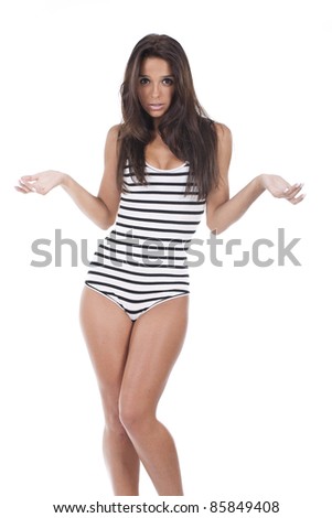 Beautiful and confused woman, standing and holding her arms out