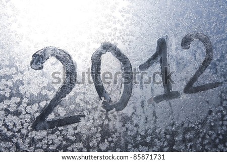 The inscription "2012" is written at the frozen window