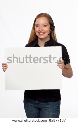 Blonde woman with customer support headset holding sign