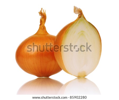 Fresh bulbs of onion not cleared on a white background