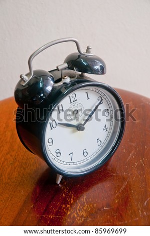 Black old style alarm clock