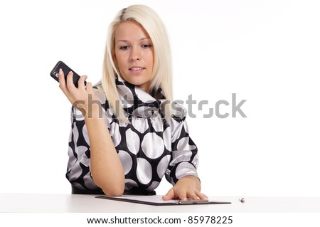 portrait of a cute blonde at table