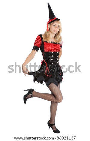 teenager girl in Halloween witch