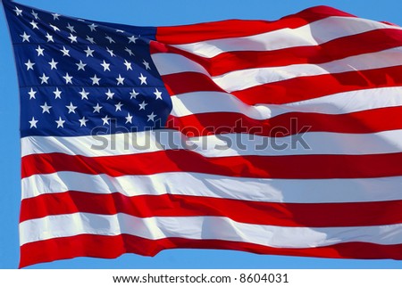 The American flag is waving in the wind.