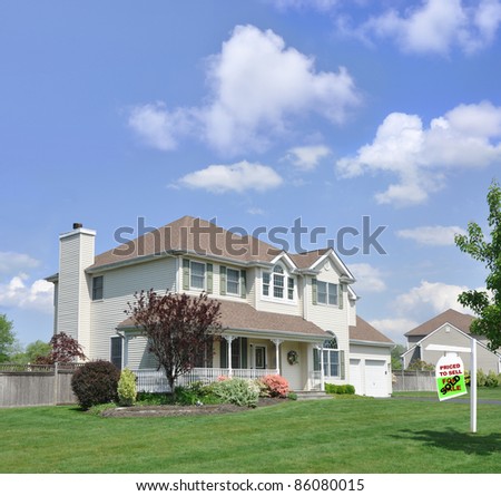 Realtor For Sale Sign on Front Yard Lawn of Beautiful Suburban Residential District Home Sunny Clouds Blue Sky