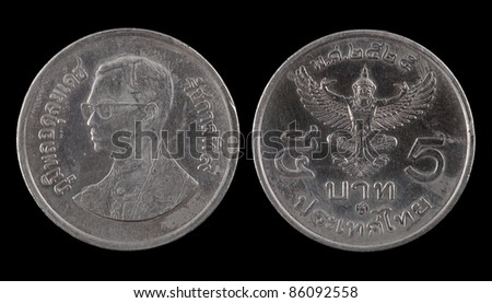 The Thai coin on the black background