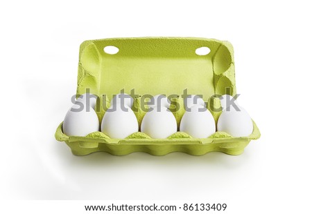 Ten white eggs in a carton box. Isolated on a white background