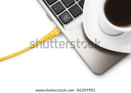 Internet Cafe -Internet cable, laptop and coffee