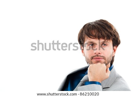 Portrait of a thoughtful businessman isolated on white. Lots of copyspace.