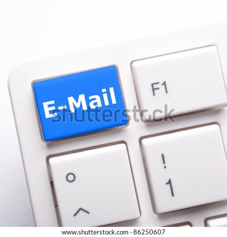 email e-mail or internet communication concept with key on keyboard