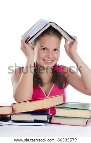 Portrait of the young girl with books