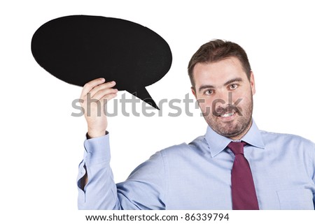 young business man holding a speech balloon over white background