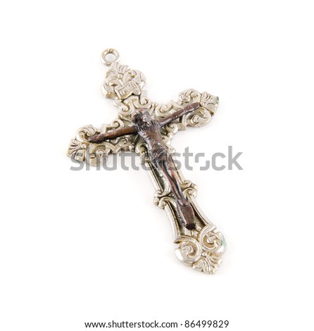 Studio shot of Large silver cross on white background
