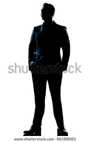 one caucasian  business man  handsome full suit standing full length serious silhouette in studio isolated white background