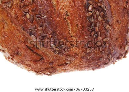 loaf of french rye bread topped with sunflower seeds isolated over white background
