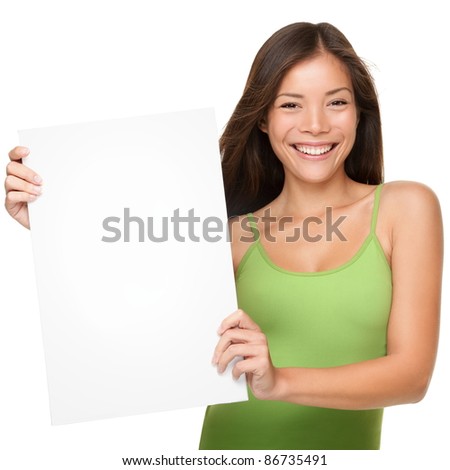 Showing sign woman. Woman showing empty blank paper sign board with copy space for text or design. Fresh and beautiful mixed race Chinese Asian / Caucasian female model  isolated on white background.