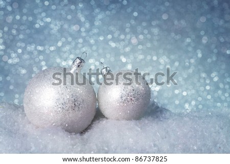 Christmas ornaments on silver background
