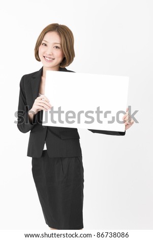 Beautiful asian business woman. Whiteboard.