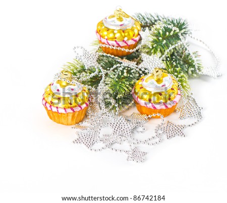 colorful cupcake as christmas tree decoration. silver garland