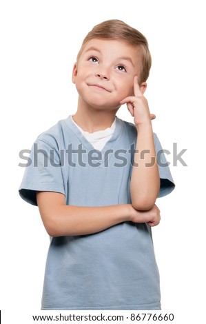 Portrait of funny little boy over white background