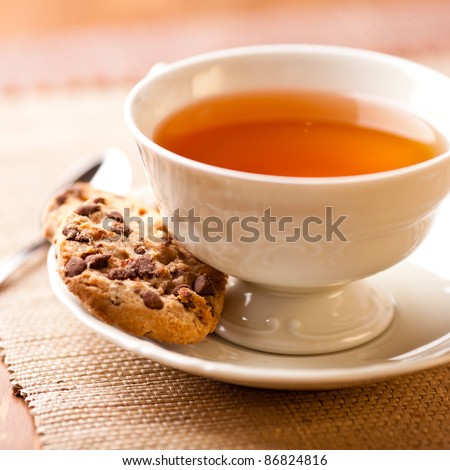 Cup of tea and two chocolate chip cookies