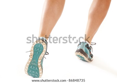A picture of a woman's legs running on a white background..