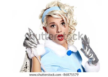 Smiling pinup woman carrying a pair of ice skates