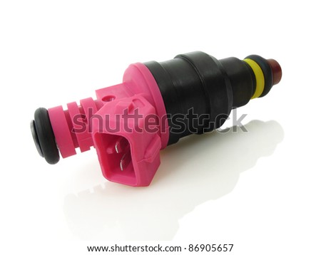 Bright pink fuel injector on a white reflective background