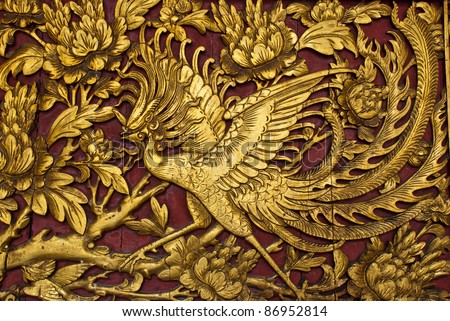 Old phenix golden plate, can be use for background, religion, life, and viltality concepts Royalty-Free Stock Photo #86952814