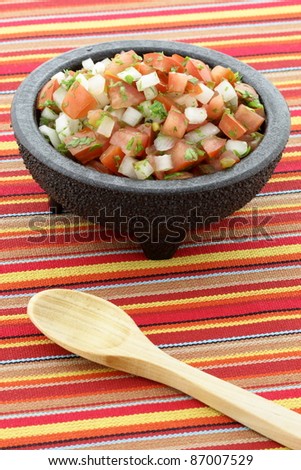 pico de gallo also called salsa fresca, is a fresh, uncooked condiment made from chopped tomato, white onion,cilantro and chilis