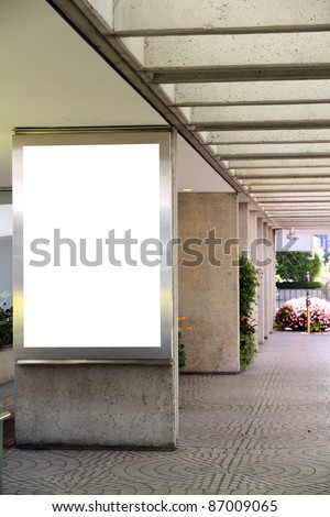 Blank billboard in a shopping mall passage - clipping path included