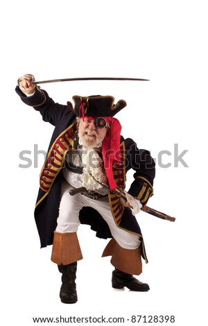 Classic 18th century bearded pirate captain lunging forward with raised sword in challenging pose. Isolated on white background with plenty of room for copy.