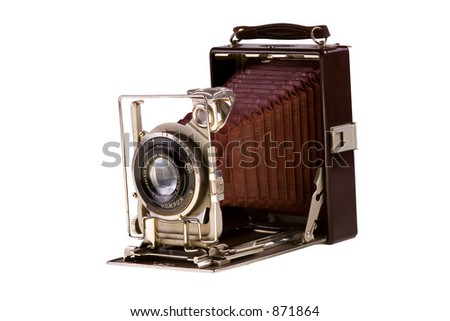 Vintage folding camera isolated on white background