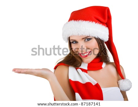 A beautiful woman dressed in a Christmas show at the open palm, isolated on white background