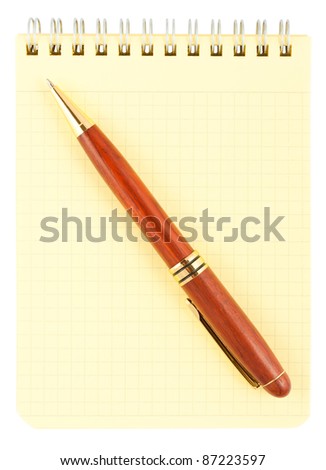 Spiral notebook and wooden pen isolated on white background