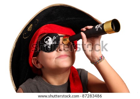portrait of young boy dressed as pirate