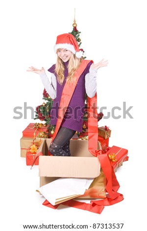 Girl in a box with Christmas tree