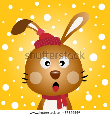 Brown rabbit with snowy background