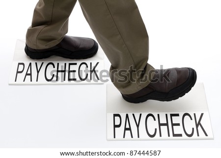Person stepping from one paycheck to another paycheck.