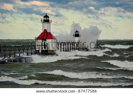 St. Joseph Lighthouse Storm.   Fall storm brings gale force winds across the great lakes and Midwest. Royalty-Free Stock Photo #87477586