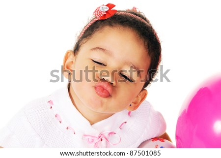Cute little girl giving a kiss